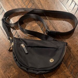 Lululemon Black Crossbody Bag with Gold Accents